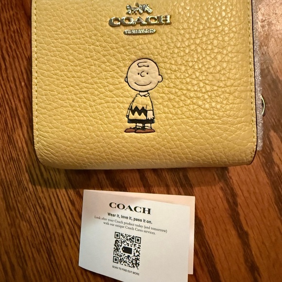 NWT Coach x Peanuts Snap Wallet featuring Charlie Brown - Picture 3 of 9